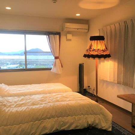 Naoshima Backpackers Guesthouse ภายนอก รูปภาพ